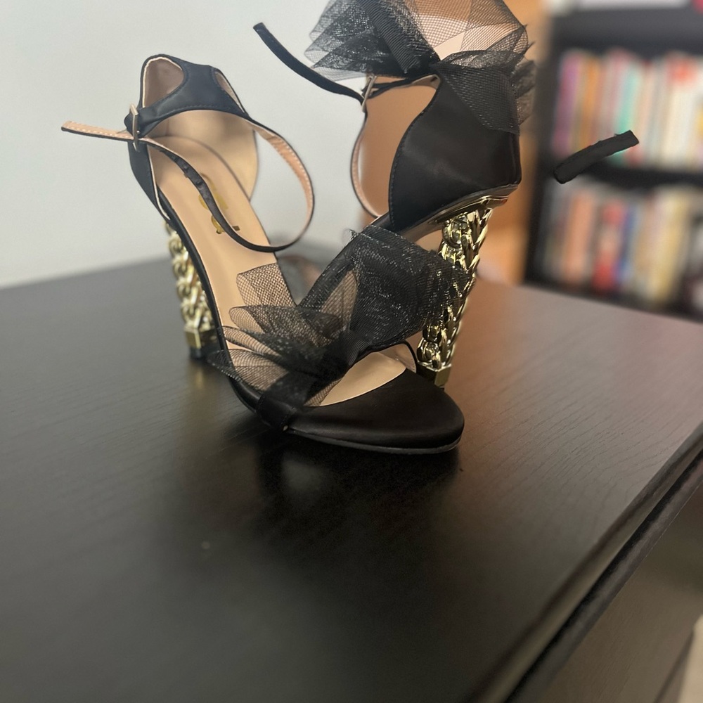 Elegant Black Heeled Sandals with Gold Chain Heel